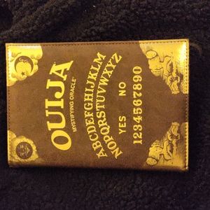 Ouija mystifying Oracle journal.